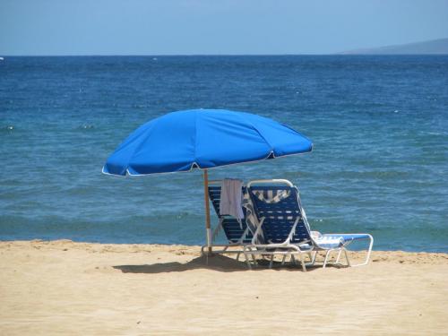 Umbrella and chairs on beach