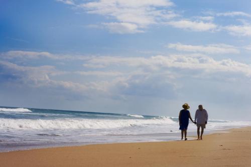 Couple walking on beach