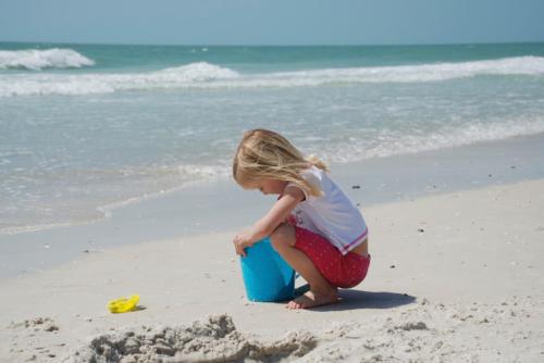 Child playing on the beach